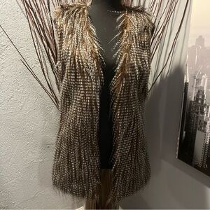 ME JANE FAUX FUR LONG VEST SIZE FITS LIKE AN XTRA SMALL.